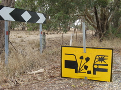 Caution on dirt roads - Australia roadsigns