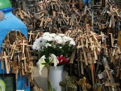 Hill of Crosses Close-up of crosses hanging from crosses Hill of Crosses Close-up of crosses hanging from crosses
