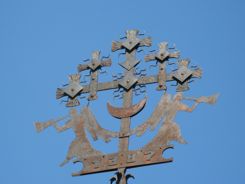 Metal cross at ancient hill in Kernave Metal cross at ancient hill in Kernave