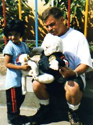 Little girl with her toy monkey - monkey meets gorilla