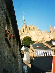 There are small hotels on Mont Saint Michel - Wee're waving from the window.