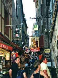 The main street of Mont Saint Michel is crowded with tourists