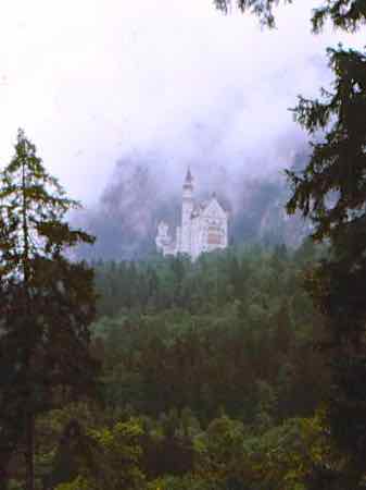 Neuschwanstein Castle floats on its hill.