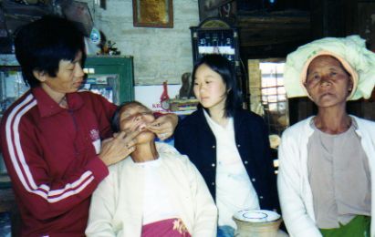 Dentist treating a patient in Pindaya Myanmar (Burma) Dentist treating a patient in Pindaya Myanmar (Burma)
