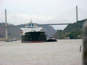 Watch tugs line up the container ships on the Panama Canal Watch tugs line up the container ships on the Panama Canal